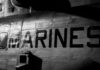 Close-up of a military helicopter with MARINES written on the side