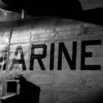 Close-up of a military helicopter with MARINES written on the side