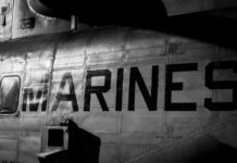 Close-up of a military helicopter with MARINES written on the side