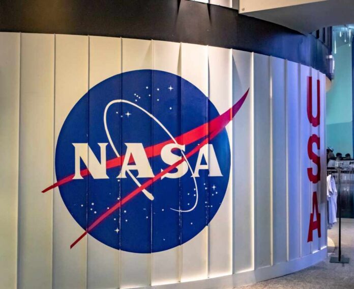 shutterstock_2458171657.jpg NASA logo displayed on a wall with the word USA