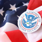 U.S. Department of Homeland Security emblem on an American flag