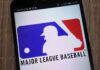 Major League Baseball logo displayed on a smartphone screen