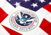 Department of Homeland Security seal on an American flag background