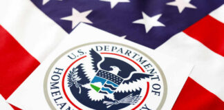 Department of Homeland Security seal on an American flag background