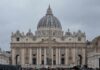 St. Peters Basilica in Vatican City with a cloudy sky and a large obelisk in the foreground