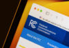 Close-up of the Federal Communications Commission website displayed on a screen