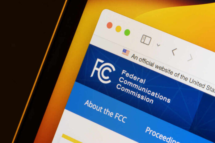 shutterstock_2543619671.jpg Close-up of the Federal Communications Commission website displayed on a screen