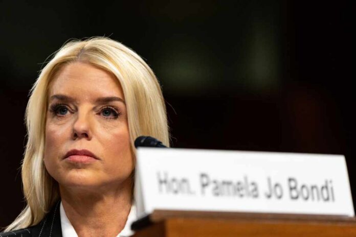 Close-up of a female speaker at a government hearing with a serious expression