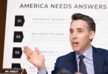 A government official speaking during a political hearing