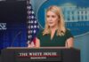 A woman speaking at a podium during a White House press briefing