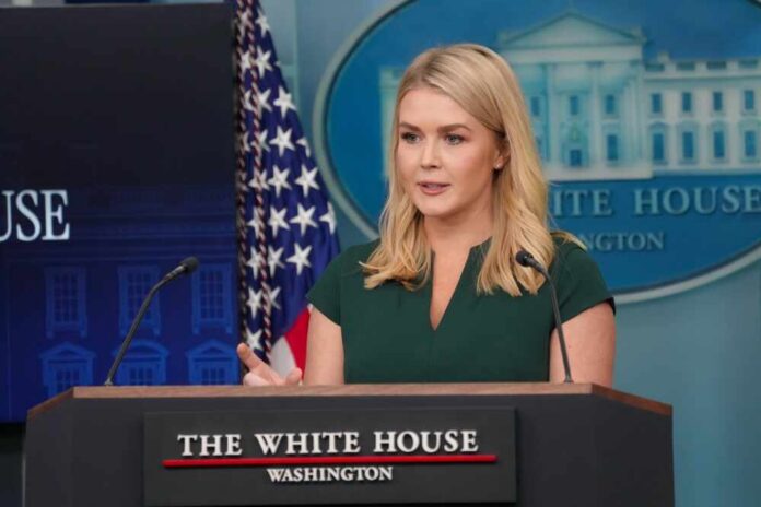 A woman speaking at a podium during a White House press briefing