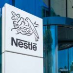 Nestlé logo displayed on a corporate building