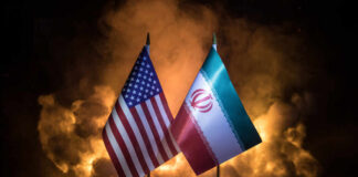 Flags of the United States and Iran displayed together