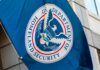 Flag of the U.S. Department of Homeland Security displayed on a building