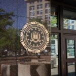 FBI seal displayed on the exterior of a government building