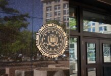 Top-Secret Breach: FBI Nabs Fort Bragg Insider FBI seal displayed on the exterior of a government building