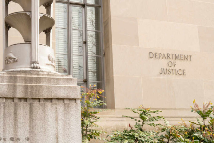 Exterior view of the Department of Justice building with decorative elements