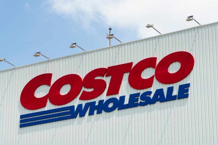 Sign of Costco Wholesale store against a blue sky