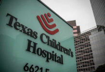 Massive Legal Blow — Texas Hospital Pays MILLIONS! Texas Children's Hospital sign in front of modern buildings
