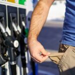 Senate Leaders Panic Over Gas Tax Plan Person at a gas station showing empty pockets