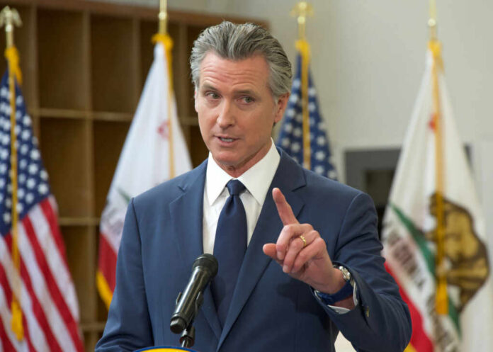 A government official speaking at a podium during a press conference