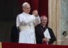 AI Power Grab: Vatican Raises Alarm A religious leader in white robes gestures during a public address