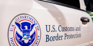 Close-up of U.S. Customs and Border Protection emblem on a vehicle