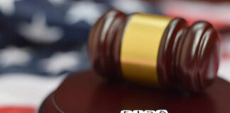 Judge’s gavel on a sound block with letter cubes spelling FISA