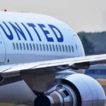 Close-up view of a United Airlines airplane wing and engine