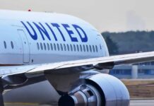 Close-up view of a United Airlines airplane wing and engine