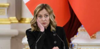 A female political leader with a serious expression during a press briefing in Kyiv