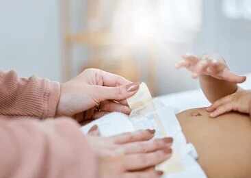 Caregiver changing a baby's diaper