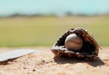 Players’ Rebellion Torches Pride Night Baseball in a worn glove on the infield dirt