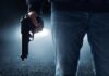 Memphis Prank Ends In Felony Charges A person holding a handgun in a dark environment