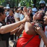 At least 26 killed and more than 100 wounded in Sri Lanka prison riot, officials say