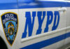 Bored Tourist Cripples Brooklyn Bridge Close-up of a New York Police Department vehicle with badge and NYPD lettering