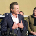 Insider Flips — Capitol Panic Ensues Politician speaking at a press conference with a group of people in the background