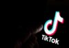 Federal TikTok Ban Ends Quietly TikTok logo on a smartphone screen