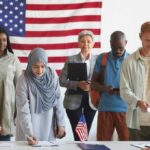 Voters standing in line at a polling station