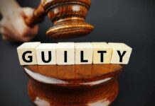 Election Fraud Case Ends Guilty Judge's gavel above blocks spelling guilty