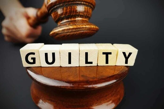 Judge's gavel above blocks spelling guilty