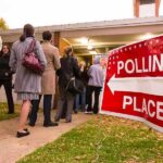 People lining up outside a polling place