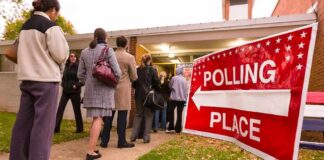 People lining up outside a polling place