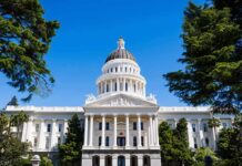 Fresno’s Tax Vote Faces Major Court Fight State capitol building with white dome and columns framed by trees