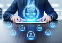 Businessperson using tablet with digital justice icons