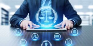 Businessperson using tablet with digital justice icons