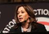 Unwanted Boost: Democrat Snubs Kamala Pitch woman speaking at a podium with microphone