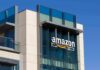 amazon logo on modern glass office building