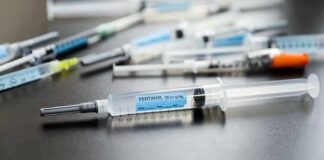 Close-up of fentanyl syringe on a table