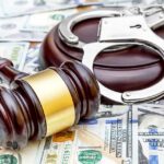 Illegal Voting Dragnet Stuns Seven States Judge's gavel and handcuffs on pile of US dollar bills